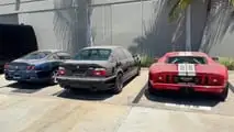 Ferrari 550, BMW M5 e Ford GT in un garage